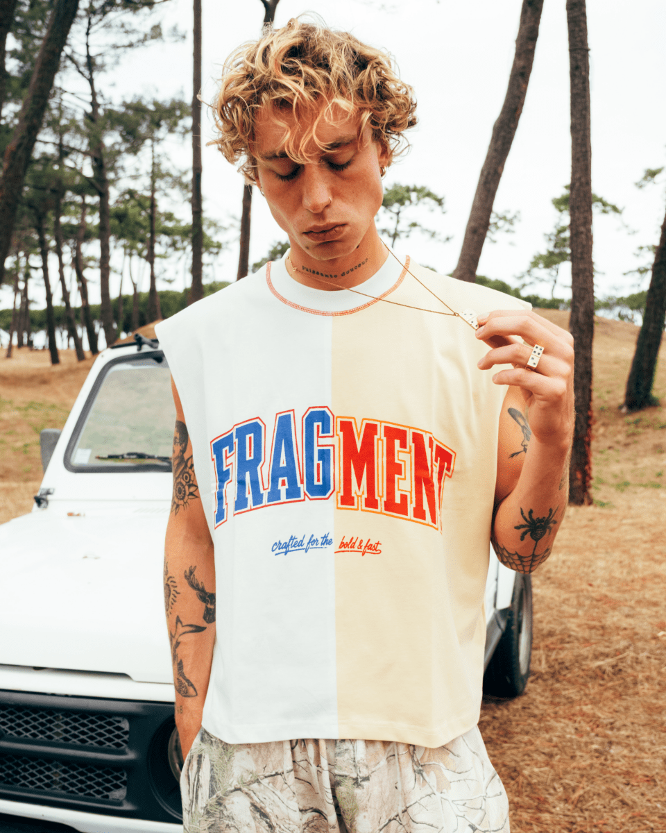 SPLIT VARSITY SLEEVELESS TEE - FRAGMENT STUDIO