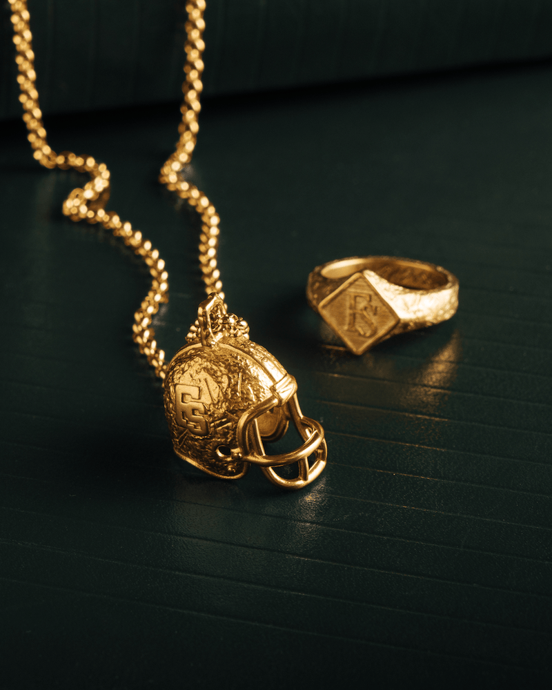FOOTBALL HELMET PENDANT [GOLD] - FRAGMENT STUDIO