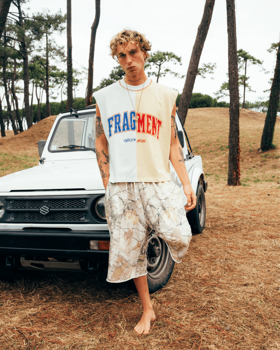 SPLIT VARSITY SLEEVELESS TEE - FRAGMENT STUDIO