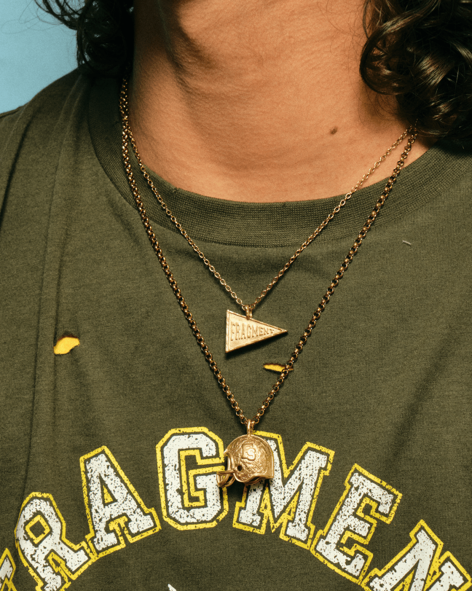 VARSITY FLAG PENDANT [GOLD] - FRAGMENT STUDIO