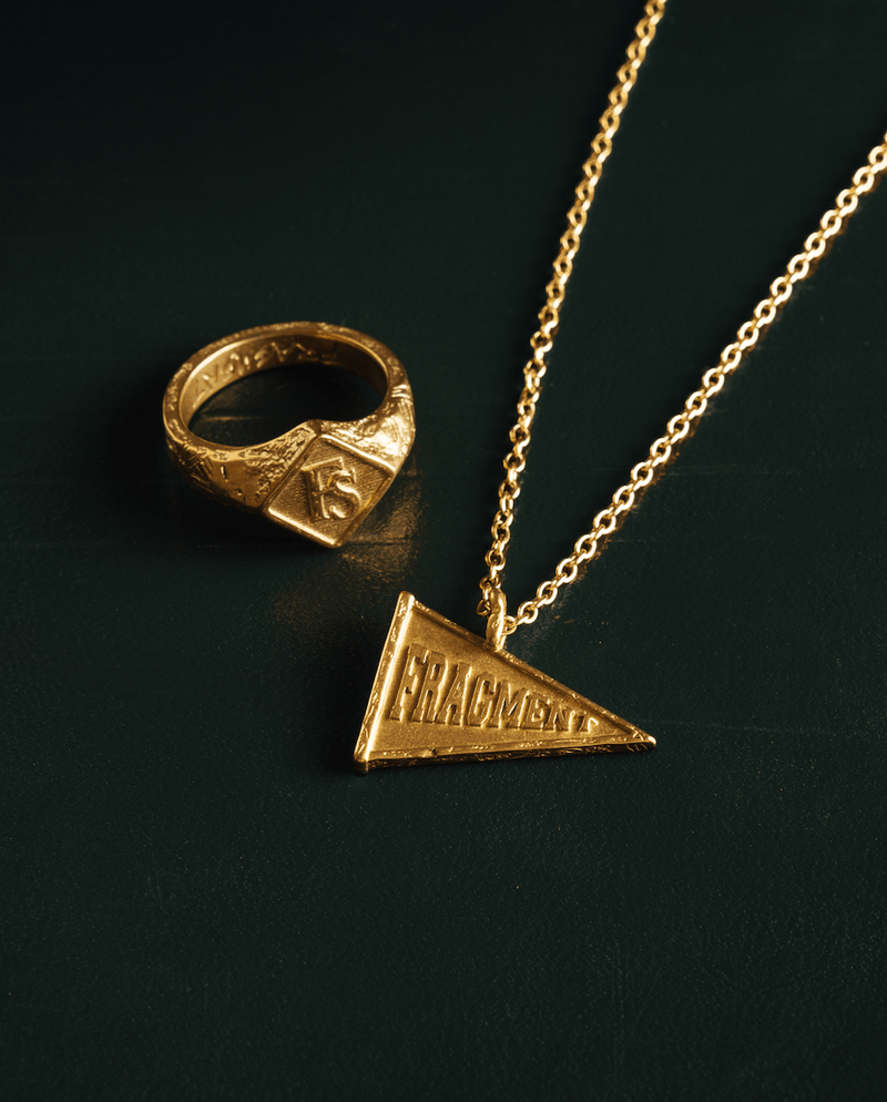 VARSITY FLAG PENDANT [GOLD] - FRAGMENT STUDIO